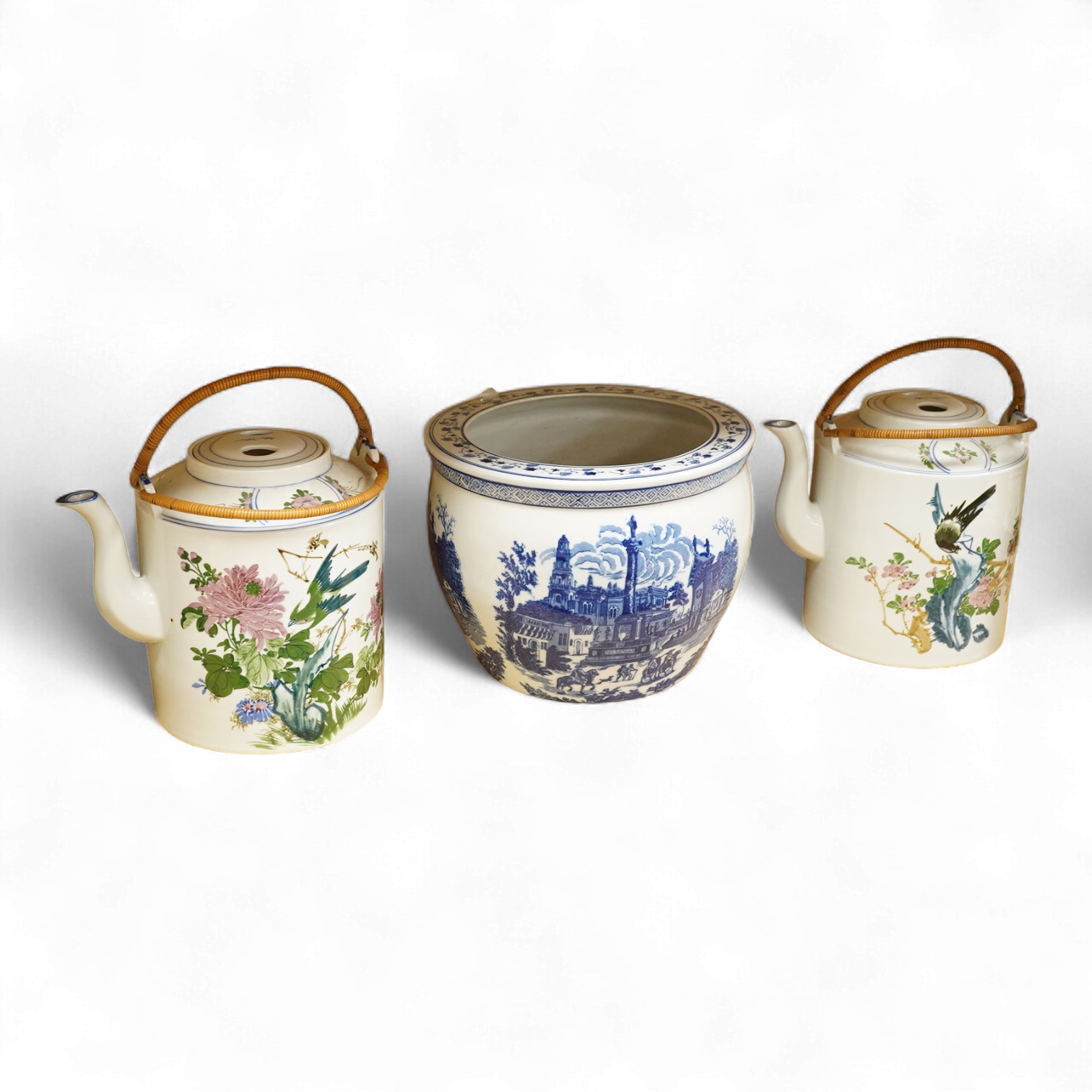 A pair of Chinese large scale teapots and a European blue and white planter, 22.5cm